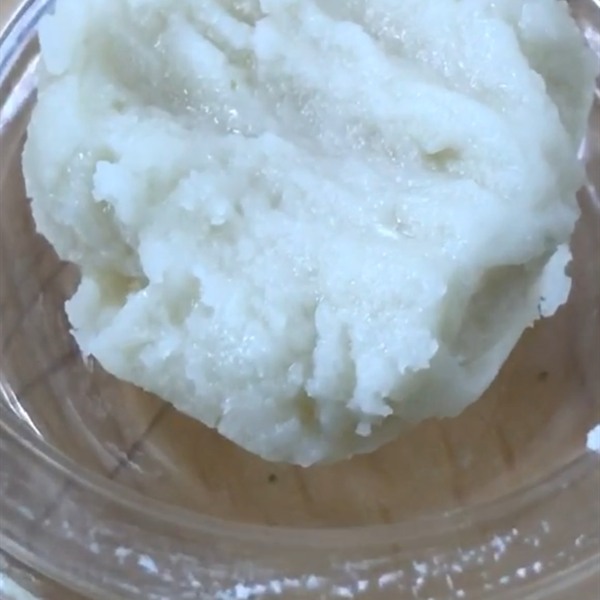 Pale whipped rosin in a glass jar