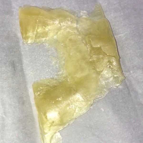 Yellow rosin slabs on parchment